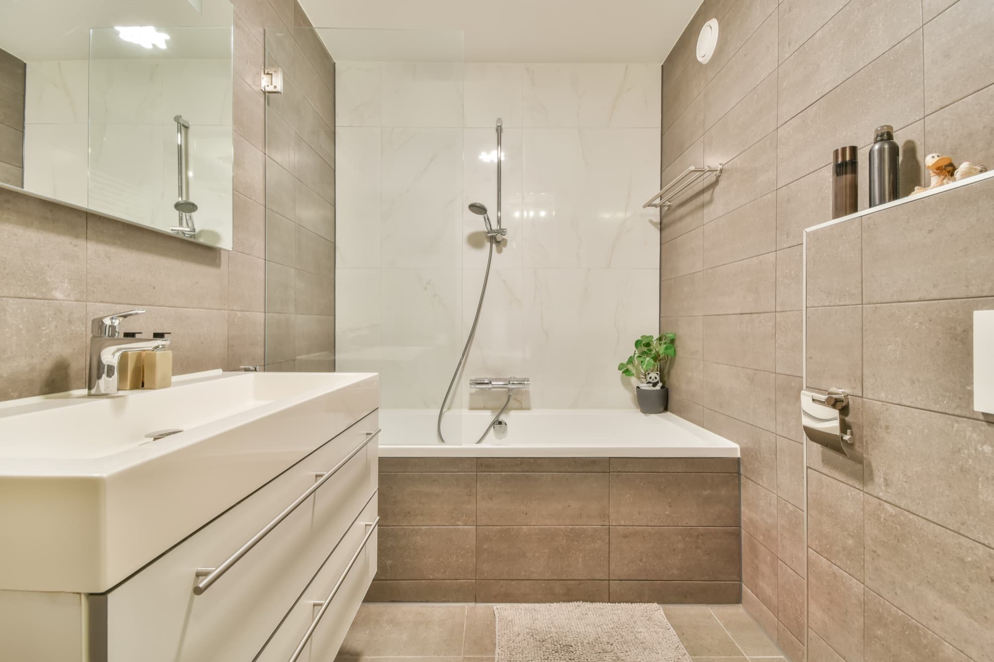 Modern bathroom interior with a bath and basin