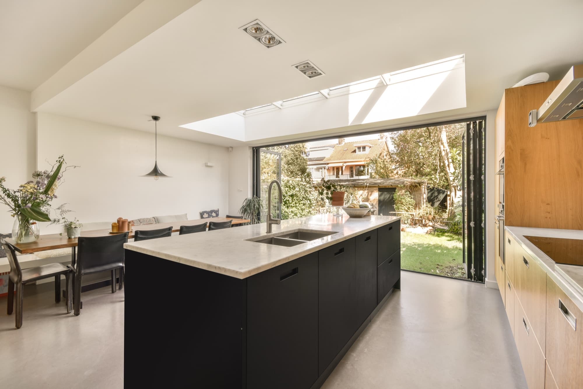 Spacious open-plan room combining lounge and dining areas