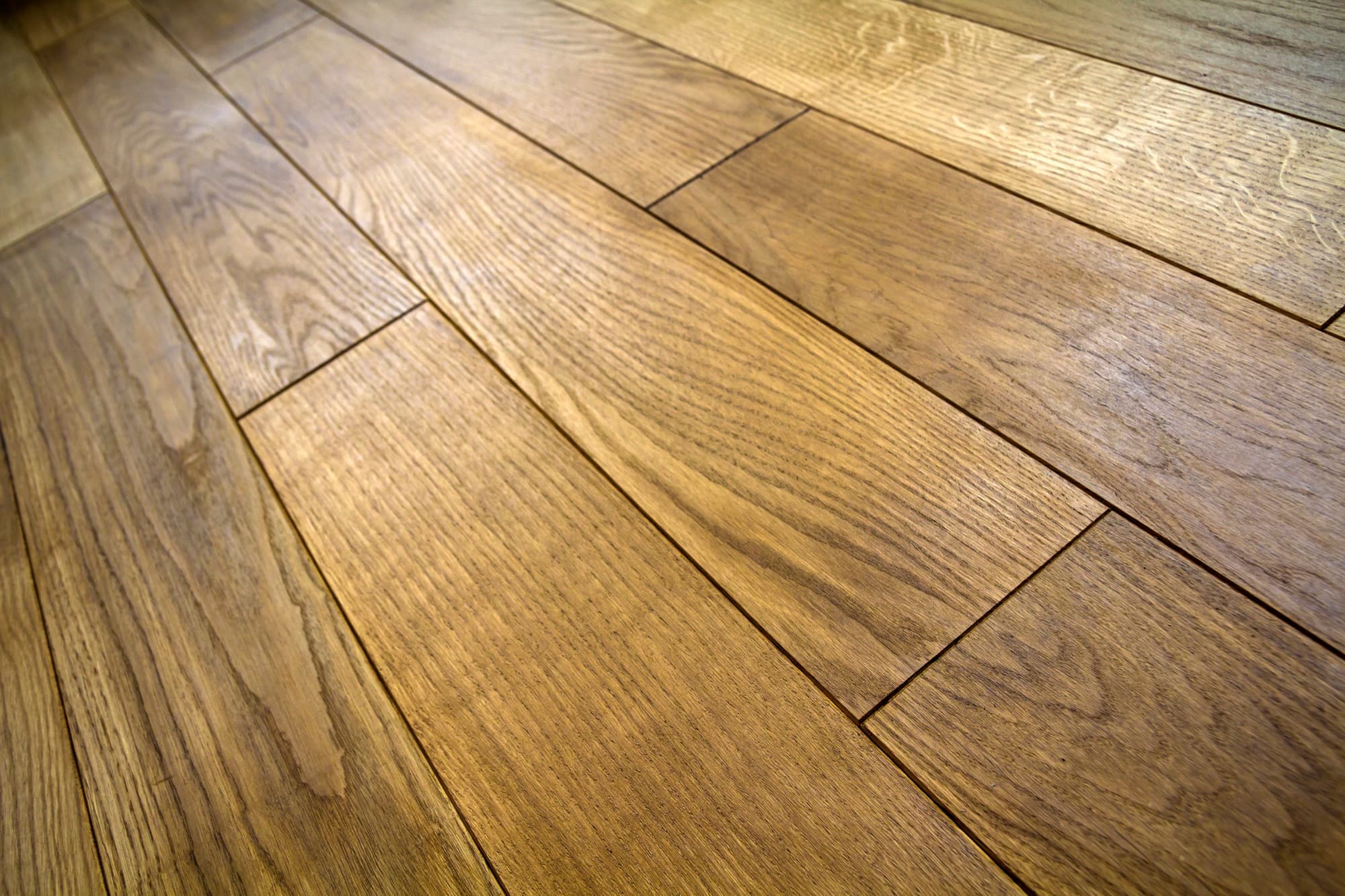 Golden brown hardwood flooring laid through a home interior
